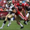 SAN FRANCISCO - NOVEMBER 18:  Drew Bennett #83 of the St. Louis Rams catches a pass over Walt Harris #27 of the San Francisco 49ers at Monster Park November 18, 2007 in San Francisco, California.  (Photo by Jed Jacobsohn/Getty Images)