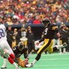 6 Jan 1996: Kicker Norm Johnson #9 of the Pittsburgh Steelers focuses on the ball just before impact on a field goal attempt during the Steelers 40-21 AFC Divisional Playoff victory over the Buffalo Bills at Three Rivers Stadium in Pittsburgh, Pennsylvani