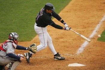 FLUSHING, NY - APRIL 23:  Catcher Mike Piazza #31 of the New York Mets swings at a Washington Nationals pitch during the game at Shea Stadium on April 23, 2005 in Flushing, New York. The Mets won 10-5. (Photo by Ezra Shaw /Getty Images)