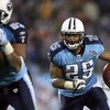 NASHVILLE, TN - JANUARY 10:  Running back LenDale White #25 of the Tennessee Titans runs the ball against the Baltimore Ravens during the AFC Divisional Playoff Game on January 10, 2009 at LP Field in Nashville, Tennessee.  (Photo by Andy Lyons/Getty Imag