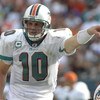 MIAMI, FL - JANUARY 4:  Quarterback Chad Pennington #10 of the Miami Dolphins directs play against the Baltimore Ravens in an NFL Wildcard Playoff Game at Dolphins Stadium on January 4, 2009 in Miami, Florida.  (Photo by Al Messerschmidt/Getty Images) 