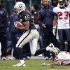 OAKLAND, CA - DECEMBER 21:  Johnnie Lee Higgins #15 of the Oakland Raiders returns a punt for an 80 yard touchdown as Dominique Barber #34 of the Houston Texans defends during an NFL game on December 21, 2008 at the Oakland-Alameda County Coliseum in Oakl