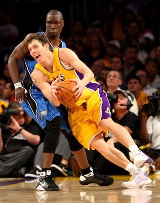 LOS ANGELES, CA - JUNE 04:  Luke Walton #4 of the Los Angeles Lakers drives against Mickael Pietrus #20 of the Orlando Magic in Game One of the 2009 NBA Finals at Staples Center on June 4, 2009 in Los Angeles, California. NOTE TO USER: User expressly ackn