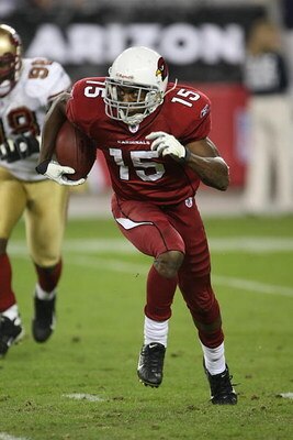 GLENDALE - NOVEMBER 25:  Steve Breaston #15 of the Arizona Cardinals carries the ball during the NFL game against the San Francisco 49ers at University of Phoenix Stadium on November 25, 2007 in Glendale, Arizona. (Photo by Stephen Dunn/Getty Images)