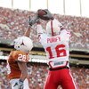 AUSTIN, TX - OCTOBER 27:  Maurice Purify #16 of the Nebraska Cornhuskers grabs a touchdown pass late in the fourth quarter against cornerback Brandon Foster #28 of the Texas Longhorns at Darrell K Royal-Texas Memorial Stadium October 27, 2007 in Austin, T