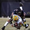 CHICAGO - DECEMBER 22: Charles Tillman #33 of the Chicago Bears brings down Donald Driver #80 of the Green Bay Packers on December 22, 2008 at Soldier Field in Chicago, Illinois. The Bears defeated the Packers 20-17 in overtime. (Photo by Jonathan Daniel/