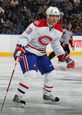 UNIONDALE, NY - APRIL 02: Alex Tanguay #13 of the Montreal Canadiens skates against the New York Islanders on April 2, 2009 at the Nassau Coliseum in Uniondale, New York. (Photo by Bruce Bennett/Getty Images)