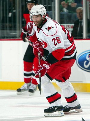 NEWARK, NJ - APRIL 23:  Erik Cole #26 of the Carolina Hurricanes skates against the New Jersey Devils during Game Five of the Eastern Conference Quarterfinal Round of the 2009 NHL Stanley Cup Playoffs on April 23, 2009 at the Prudential Center in Newark, 