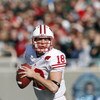 EAST LANSING - NOVEMBER 1:  Quarterback Dustin Sherer #18 of the  Wisconsin Badgers looks to pass the ball during the game against the Michigan State Spartans at Spartan Stadium on November 1, 2008 in East Lansing, Michigan. (Photo by: Gregory Shamus/Gett