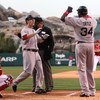 ANAHEIM, CA - MAY 13: Jason Bay #44 of the Boston Red Sox is greeted at home by David Ortiz #34 after Bay's two run home run in the first inning against the Los Angeles Angels of Anaheim on May 13, 2009 at Angel Stadium in Anaheim, California.   (Photo by