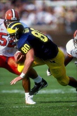 12 Sep 1998:  Tight end Jerame Tuman #80 of the Michigan Wolverines in action during the game against the Syracuse Orangemen at the Michigan Stadium in Ann Arbor, Michigan. The Orangemen defeated the Wolverines 38-28. Mandatory Credit: Vincent Laforet  /A