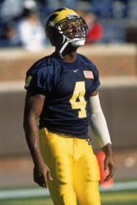 10 Nov 2001:  Wide Receiver Marquise Walker #4 of the Michigan Wolverines watching the ball in the air during the game against the Minnesota Golden Gophers at the Michigan Stadium in Ann Arbor, Michigan. The Wolverines defeated the Golden Gophers 31-10. M