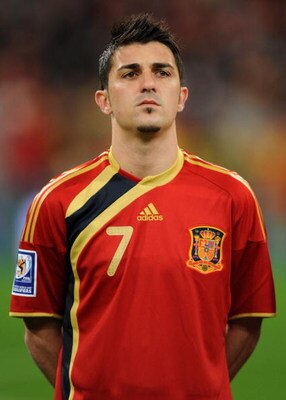 MADRID, SPAIN - MARCH 28:  David Villa of Spain listens to his countries national anthom during the FIFA2010 World Cup Qualifier match between Spain and Turkey at the Estadio Santiago Bernabeu on March 28, 2009 in Madrid, Spain. Spain won the match 1-0.  