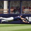 NEW YORK - APRIL 19:  Grady Sizemore #24 of the Cleveland Indians dives for a ball hit by Derek Jeter #2 of the New York Yankees at Yankee Stadium on April 19, 2009 in the Bronx borough of New York City.  (Photo by Ezra Shaw/Getty Images)