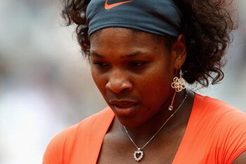 PARIS - MAY 26:  Serena Williams of USA looks on during the Women's First Round match against Klara Zakopalova of Czech Republic on day three of the French Open at Roland Garros on May 26, 2009 in Paris, France.  (Photo by Ryan Pierse/Getty Images)