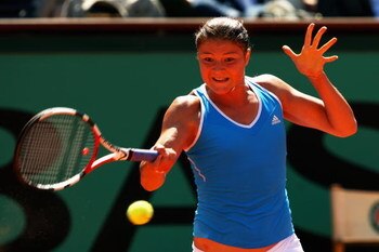 PARIS - JUNE 04:  Dinara Safina of Russia hits a forehand during the Women's Singles Semi Final match against Dominika Cibulkova of Slovakia on day Twelve of the French Open at Roland Garros on June 4, 2009 in Paris, France.  (Photo by Clive Brunskill/Get