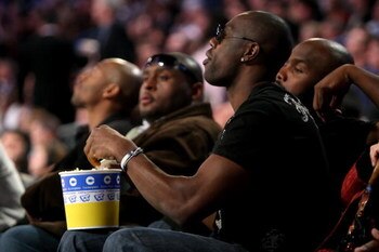 NEW ORLEANS - FEBRUARY 16: NFL star Terrell Owens eats popcorn as he sits courtside at NBA All-Star Saturday Night, part of 2008 NBA All-Star Weekend at the New Orleans Arena on February 16, 2008 in New Orleans, Louisiana. NOTE TO USER: User expressly ack