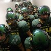 SAN DIEGO, CA - DECEMBER 30:  The University of Oregon Ducks prepare to enter the field against the Oklahoma State University Cowboys during the Pacific Life Holiday Bowl at Qualcomm Stadium on December 30, 2008 in San Diego, California. (Photo by Donald 