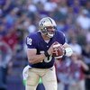 SEATTLE - SEPTEMBER 13:  Quarterback Jake Locker #10 of the Washington Huskies during the game against the Oklahoma Sooners on September 13, 2008 at Husky Stadium in Seattle, Washington. The Sooners defeated the Huskies 55-14.(Photo by Otto Greule Jr/Gett