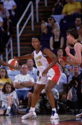 4 Jul 2001:  Jennifer Gillom #22 of the Phoenix Mercury dribbling the ball during the WNBA game against the Miami Sol at the America West Arena in Phoenix, Arizona. The Mercury defeated the Sol 60-47.  NOTE TO USER: It is expressly understood that the onl