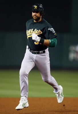 ANAHEIM, CA - APRIL 05:  Mike Piazza #31 of the Oakland Athletics rounds the bases after hitting the game winning homerun against the Los Angeles Angels of Anaheim at Angel Stadium during the game on April 5, 2007 in Anaheim, California. The Athletics def