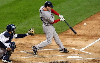 NEW YORK - MAY 05:  Jason Bay #44 of the Boston Red Sox connects for a first-inning three-run home run against the New York Yankees on May 5, 2009 at Yankee Stadium in the Bronx borough of New York City.  (Photo by Jim McIsaac/Getty Images)