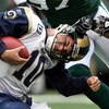 EAST RUTHERFORD, NJ - NOVEMBER 09:  Marc Bulger #10 of the St. Louis Rams is sacked against the New York Jets at Giants Stadium on November 9, 2008 in East Rutherford, New Jersey.  (Photo by Nick Laham/Getty Images)