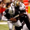 NEW ORLEANS - OCTOBER 12:  Bobby McCray #93 of the New Orleans Saints sacks JaMarcus Russell #2 of the Oakland Raiders on October 12, 2008 at the Superdome in New Orleans, Louisiana.  The Saints defeated the Raiders 34-3.   (Photo by Chris Graythen/Getty 