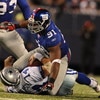 EAST RUTHERFORD, NJ - NOVEMBER 02:  Justin Tuck #91 of the New York Giants sacks Brad Johnson #14 of the Dallas Cowboys during their game on November 2, 2008 at Giants Stadium in East Rutherford, New Jersey.  (Photo by Al Bello/Getty Images)