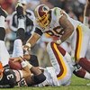 LANDOVER, MD - OCTOBER 19: Quarterback Derek Anderson #3 of the Cleveland Browns gets sacked by defensive end Andre Carter #99 and defensive tackle Cornelius Griffin #96 of the Washington Redskins on October 19, 2008 at FedEx Field in Landover, Maryland. 