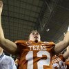 GLENDALE, AZ - JANUARY 05:  Quarterback Colt McCoy #12 of the Texas Longhorns celebrates after defeating the Ohio State Buckeyes in the Tostitos Fiesta Bowl Game on January 5, 2009 at University of Phoenix Stadium in Glendale, Arizona. The Longhorns defea
