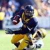 BERKELEY, CA - OCTOBER 25:  Runningback Jahvid Best #4 of the Cal Golden Bears is brought down by Rahim Moore #3 of the UCLA Bruins during the fourth quarter at Memorial Stadium on October 25, 2008 in Berkeley, California. Cal defeated UCLA 41-20. (Photo 