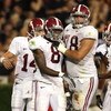 ATHENS, GA - SEPTEMBER 27:  Quarterback John Parker Wilson #14, offensiv lineman Mike Johnson #78 and wide receiver Julio Jones #8 of the Alabama Crimson Tide celebrate Jones' touchdown catch in the second quarter against the Georgia Bulldogs at Sanford S