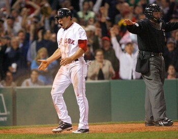 BOSTON - APRIL 26: Jacoby Ellsbury #46 of the Boston Red Sox celebrates after stealing home against the New York Yankees at Fenway Park April 26, 2009 in Boston, Massachusetts. Jacoby Ellsbury recorded the first steal of home by a Red Sox player in 10 yea