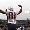 OAKLAND, CA - DECEMBER 14:  Randy Moss #81 of the New England Patriots celeberates after scoring a touchdwon against the Oakland Raiders during an NFL game on December 14, 2008 at the Oakland-Alameda County Coliseum in Oakland, California.  (Photo by Jed 