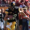 TAMPA, FL - JANUARY 01:  Ricky Stanzi #12 of the Iowa Hawkeyes runs upfield against the South Carolina Gamecocks during the Outback Bowl on January 1, 2009 at Raymond James Stadium in Tampa, Florida.  (Photo by Scott Halleran/Getty Images)