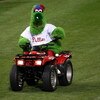 PHILADELPHIA - OCTOBER 29:  The Philly Phanatic, mascot of the Philadelphia Phillies rides around the field on a 4 wheel atv against the Tampa Bay Rays during the continuation of game five of the 2008 MLB World Series on October 29, 2008 at Citizens Bank 