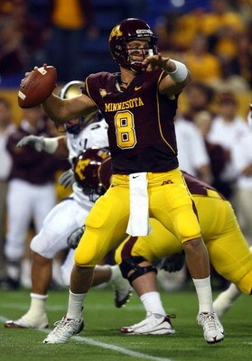 MINNEAPOLIS - SEPTEMBER 13:  Quarterback Adam Weber #8 of the Minnesota Golden Gophers drops back to pass against the Montana State Bobcats at the Metrodome on September 13, 2008 in Minneapolis, Minnesota.  (Photo by Jeff Gross/Getty Images)