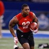 INDIANAPOLIS, IN - FEBRUARY 22:  Running back Knowshon Moreno of Georgia runs with the football during the NFL Scouting Combine presented by Under Armour at Lucas Oil Stadium on February 22, 2009 in Indianapolis, Indiana. (Photo by Scott Boehm/Getty Image