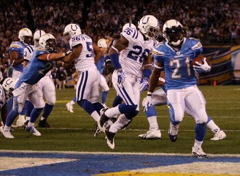 SAN DIEGO - JANUARY 03:  LaDainian Tomlinson #21 of the San Diego Chargers scores a touchdown against the Indianapolis Colts in the AFC Wild Card Game on January 3, 2009 at Qualcomm Stadium in San Diego, California.  (Photo by Stephen Dunn/Getty Images)