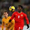 SYDNEY, AUSTRALIA - JUNE 10:  Jaycee Okwunwanne of Bahrain watches the ball during the 2010 FIFA World Cup Asian qualifying match between the Australian Socceroos and Bahrain at ANZ Stadium on June 10, 2009 in Sydney, Australia.  (Photo by Cameron Spencer