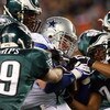 PHILADELPHIA - DECEMBER 28:  Akeem Jordan #56, Sheldon Brown #24 and Quintin Demps #39 of the Philadelphia Eagles tackle Jason Witten #82 of the Dallas Cowboys on December 28, 2008 at Lincoln Financial Field in Philadelphia, Pennsylvania. The Eagles defea