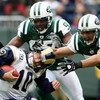 EAST RUTHERFORD, NJ - NOVEMBER 09: Calvin Pace #97 and Eric Barton #50 of the New York Jets sack Marc Bulger #10 of the St. Louis Rams at Giants Stadium on November 9, 2008 in East Rutherford, New Jersey.  (Photo by Nick Laham/Getty Images)