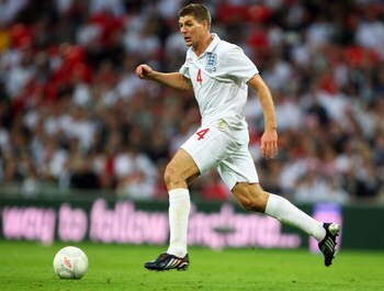 LONDON, ENGLAND - JUNE 10:  Steven Gerrard of England runs with the ball during the FIFA 2010 World Cup Group 6 Qualifying match between England and Andorra at Wembley Stadium on June 10, 2009 in London, England.  (Photo by Mark Thompson/Getty Images)