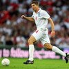 LONDON, ENGLAND - JUNE 10:  Steven Gerrard of England runs with the ball during the FIFA 2010 World Cup Group 6 Qualifying match between England and Andorra at Wembley Stadium on June 10, 2009 in London, England.  (Photo by Mark Thompson/Getty Images)