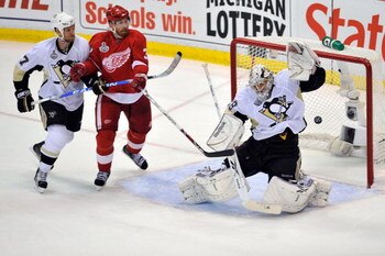 DETROIT - JUNE 12:  Goaltender Marc-Andre Fleury #29 of the Pittsburgh Penguins gives up a goal to Jonathan Ericsson #52 (not pictured) of the Detroit Red Wings during Game Seven of the 2009 NHL Stanley Cup Finals at Joe Louis Arena on June 12, 2009 in De