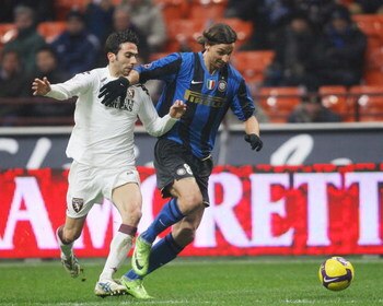 MILAN, ITALY - FEBRUARY 01:  Zlatan Ibrahimovic of Inter and  Paolo Della Fiore of Torino during the Serie A match between Inter Milan and Torino at the Meazza Stadio on February 01, 2009 in Turin, Italy. (Photo by New Press/Getty Images)