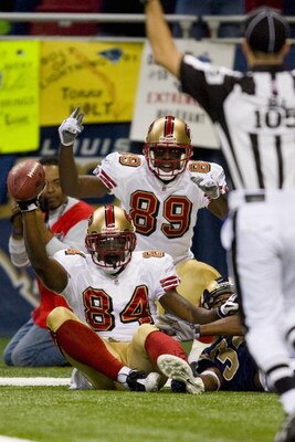 ST. LOUIS, MO - DECEMBER 21: Josh Morgan #84 and Jason Hill #89 both of the San Francisco 49ers celebrate Morgan's touchdown against the St. Louis Rams at the Edward Jones Dome on December 21, 2008 in St. Louis, Missouri.  The 49ers beat the Rams 17-16.  