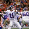 SAN FRANCISCO - DECEMBER 29:  Quarterback Phil Simms #11 of the New York Giants passes against the San Francisco 49ers during the NFC Divisional Playoff game at Candlestick Park on December 29, 1984 in San Francisco, California.  The 49ers won 21-10.  (Ph