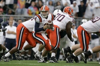 STATE COLLEGE, PA - SEPTEMBER 12: Quarterback Greg Paulus #2 of the Syracuse Orangemen looks to hand off the ball during the first half against the Penn State Nittany Lions at Beaver Stadium  September 12, 2009 in State College, Pennsylvania. (Photo by Ch